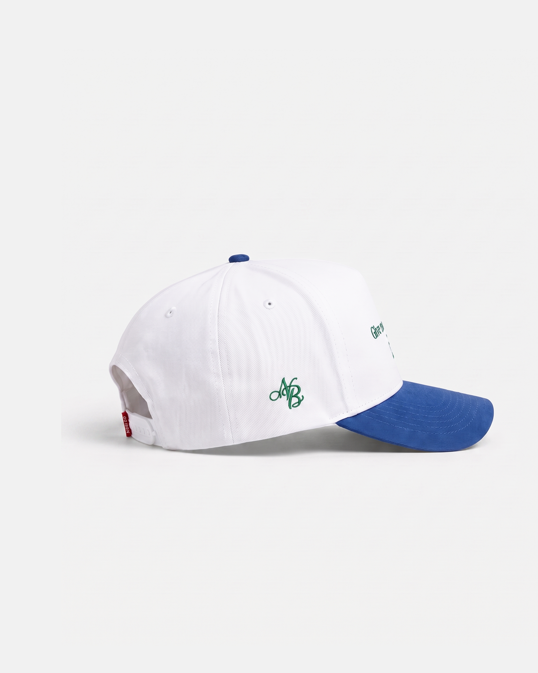 Give More Get More Hat side view with green NB monogram and white snapback closure
