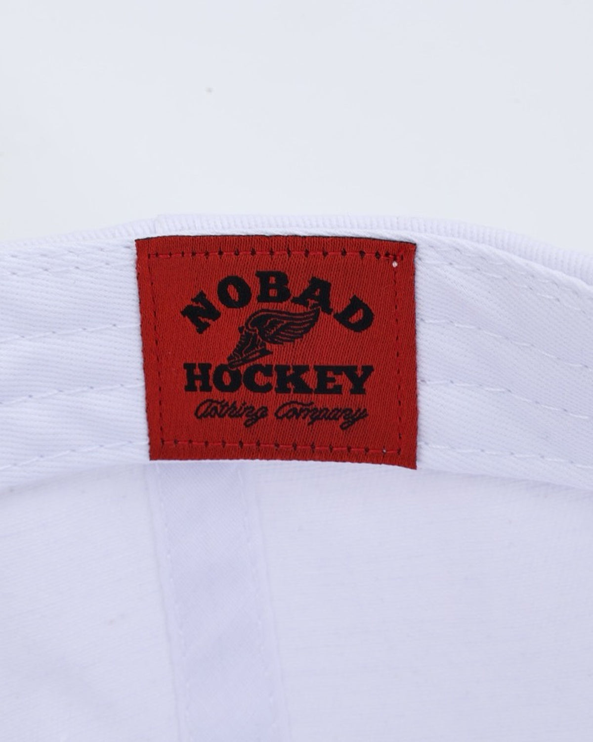 Vintage Hockey Hat in White & Navy, woven label detail