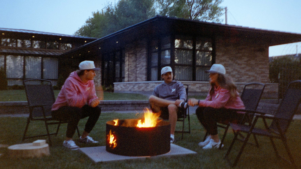 Make Room Sale: friends around a campfire at the lodge in NOBAD hoodies