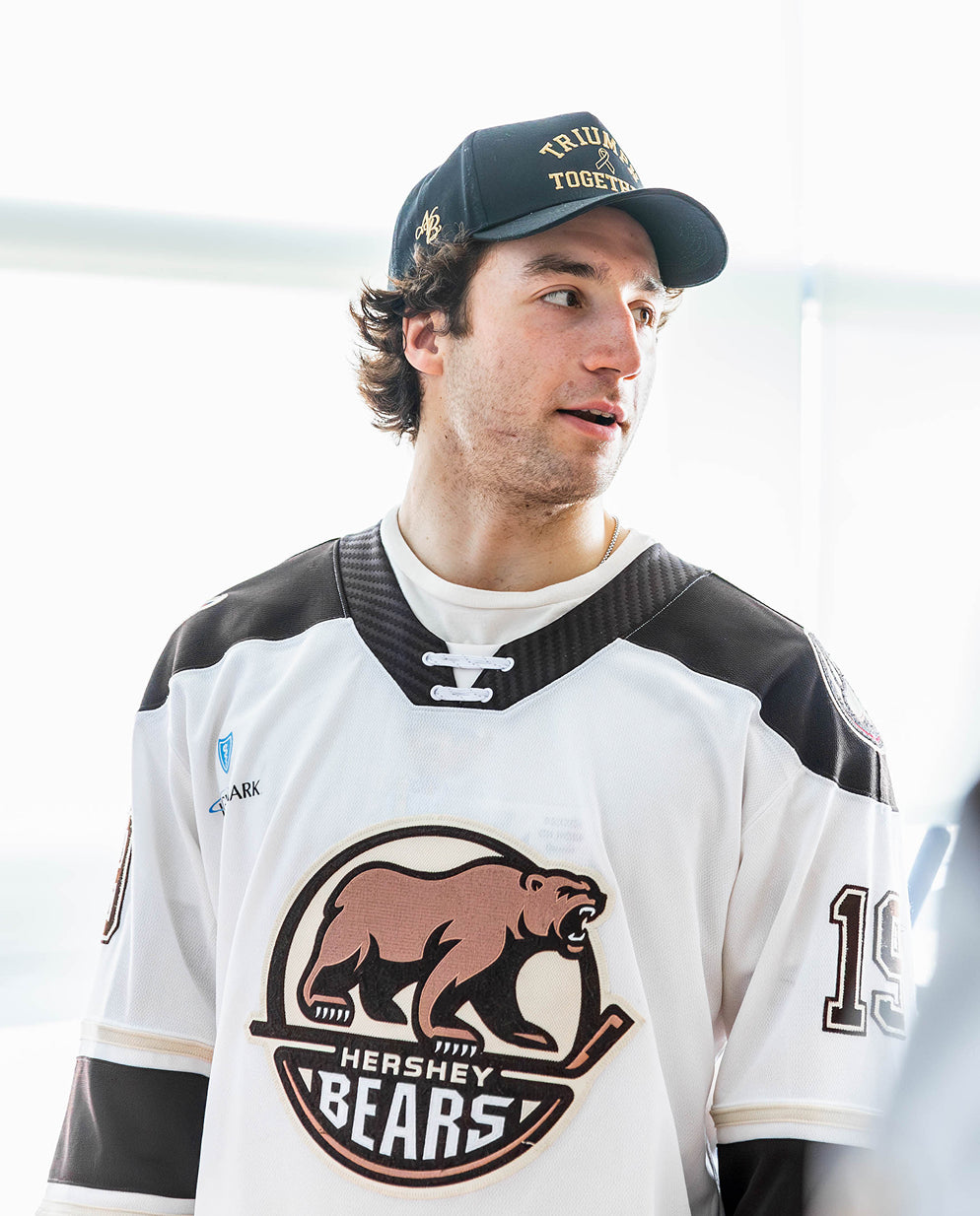 Hershey Bears player wearing the Triumph Together hat